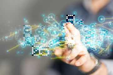 Businessman pressing document icon over computer binary code