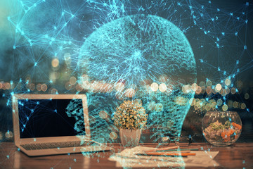 Multi exposure of work table with computer and brain hologram. Brainstorm concept.