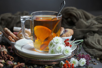 Tea in a cup on an old background