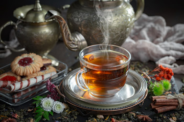 Tea in a cup on an old background