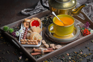 Tea in a cup on an old background