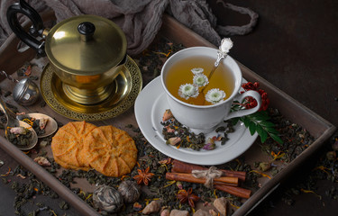 Tea in a cup on an old background