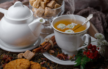 Tea in a cup on an old background