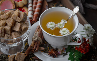 Tea in a cup on an old background