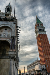 Fototapeta na wymiar Piazza San Marco in Venice. Venice is famous for its settings, archtecture and artwork. A part of Venice is resignated as a World Heritage site.