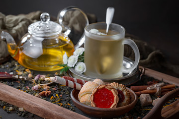Tea hot drink on old background in composition on the table