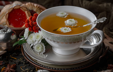 Tea in a cup on an old background