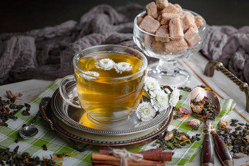 Tea in a cup on an old background