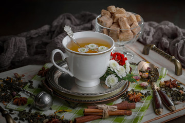 Tea in a cup on an old background