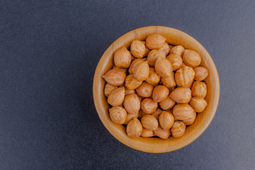 hazelnuts in a wooden plate