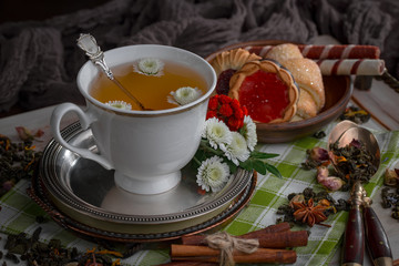 Tea in a cup on an old background