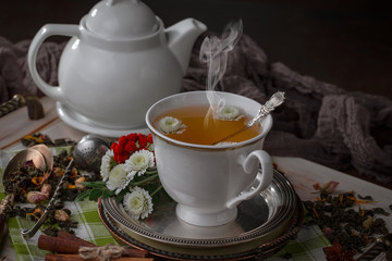Tea in a cup on an old background