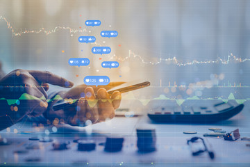 Double exposure of businessman using a social media marketing concept with notification icons with Investors are calculating on calculator investment costs, business finance concept. - obrazy, fototapety, plakaty