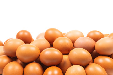 Group of brown eggs isolated on white.