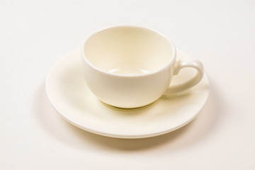 White cup isolated on white background.