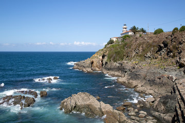 Fototapeta na wymiar Lighthouse at Cudillero; Asturias