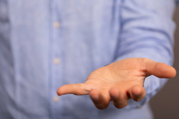 Businessman without head holding something without theme