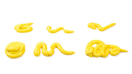 Yellow cheese sauce splashes isolated on white background