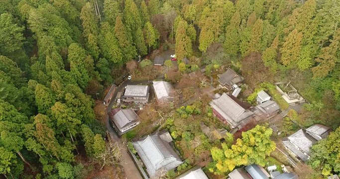 Famous Jakko-in temple of Temdai sect in Ohara village near Kyoto &ndash; Japan. Historic heritage temple with garden deep in forests at the edge of valley seen from above.