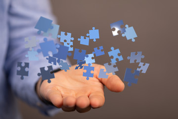 puzzle hand solution concept business.
