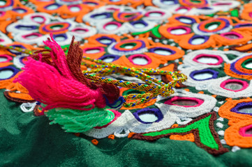 handmade needlework and embroidery rope close up view,embroidery design and rope,Embroidery process. Needlework