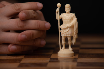 Chess piece of a king on a chessboard