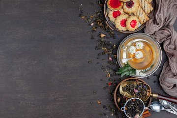 Hot tea in a cup on an old background.