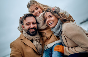 Family on the beach near the sea