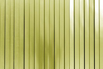 Metal list wall texture of fence in yellow tone.