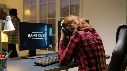 Game over for a professional caucasian female gamer © DC Studio