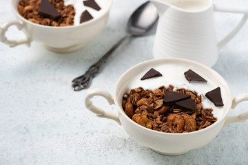 Granola, oatmeal with chocolate food background