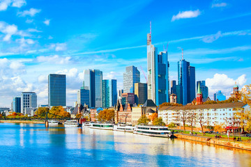 Naklejka premium Skyline cityscape of Frankfurt, Germany during sunny day. Frankfurt Main in a financial capital of Europe.