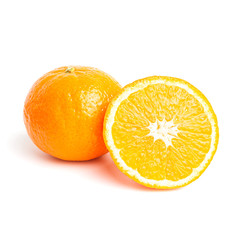 Whole orange and sliced round halves of citrus isolated on white background