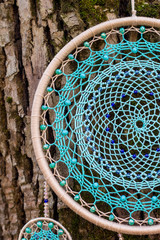 Handmade dream catcher with feathers threads and beads rope hanging