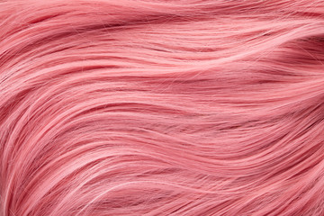 Close up view of colored pink hair
