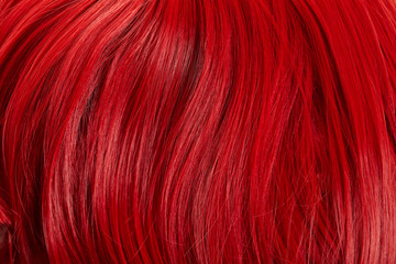 Naklejka premium Close up view of colored red hair