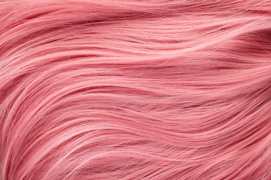 Close up view of colored pink hair