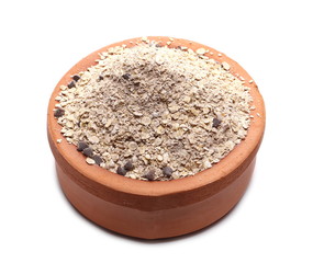 Oat flakes and power, instant oats with chocolate and quinoa seeds in clay bowl isolated on white...
