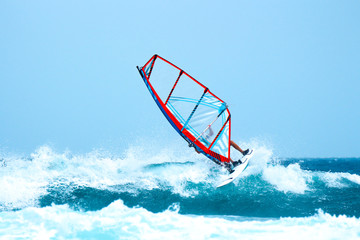 Windsurf among the waves