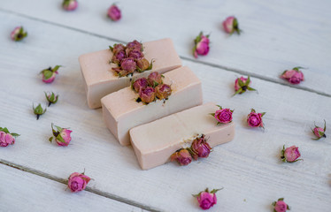 handmade soaps on rustic wooden board. Spa concept
