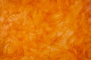 Textured wall brushed painted Background, Abstract Orange Oil Color.