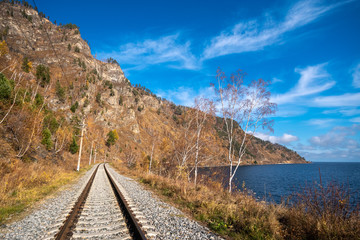 Fototapeta na wymiar Railway along the coast of Lake Baikal