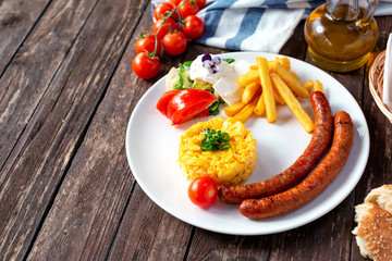 Breakfast with explosive energy, scrambled eggs and sausage