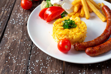 Scrambled eggs with sausage, gourmand delicacy