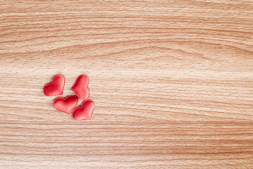 Red heart shape on a wooden table, Valentines Day background, Love concept