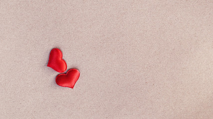 Red heart shape on a brown paper background, Valentines Day background, Love concept