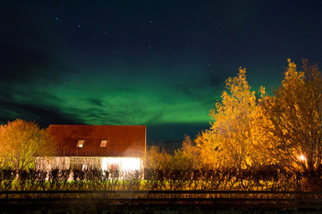 Beautiful landscape with Aurora borealis taken in Iceland on a clear sky night