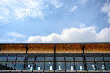 Wooden building with terrace and blue sky