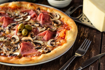 Close up of a tasty pizza and its toppings