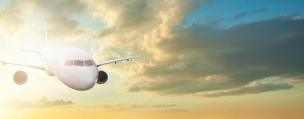 Obraz na płótnie Canvas Holidays, vacation and travel background. Plane against skyline